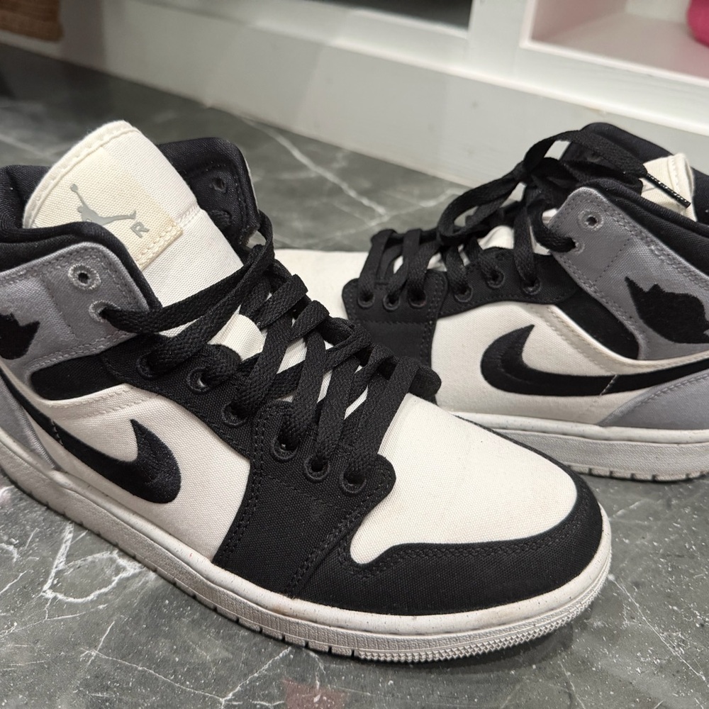 Jordan Nike Black and White High-Top Sneakers